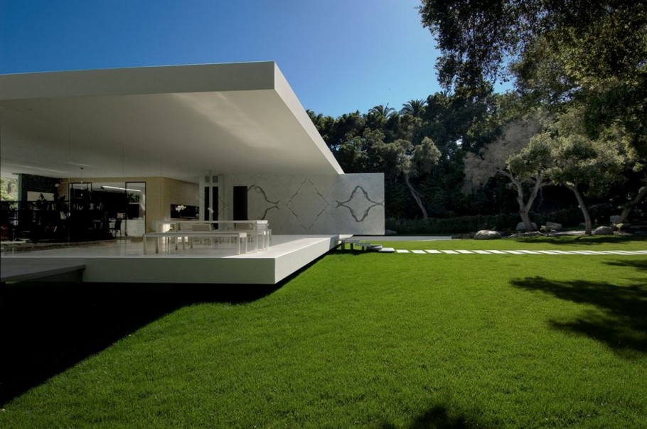 Casas de ensueño: una villa sin paredes y cuyo garaje es un museo de