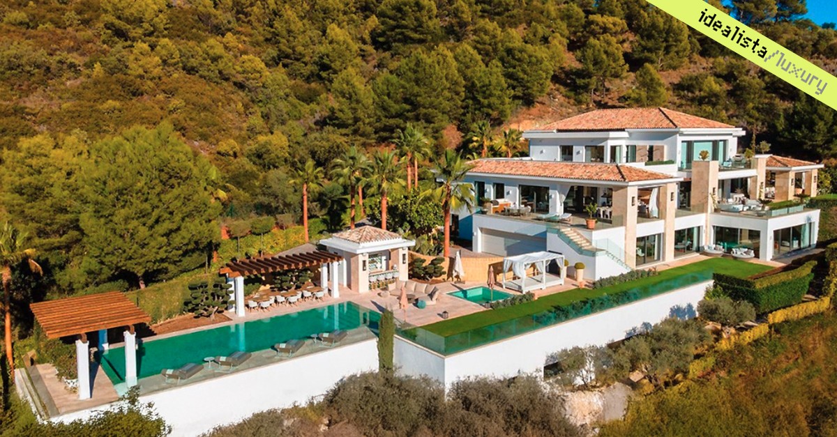 What type of luxury housing do foreigners buy in Spain?