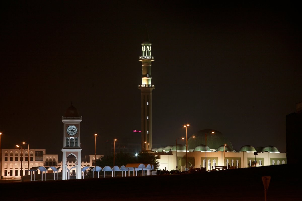 now-and-here-is-the-clock-tower-today-dwarfed-by-the-grand-mosque-at-the-emiri-palace-in-the-bac