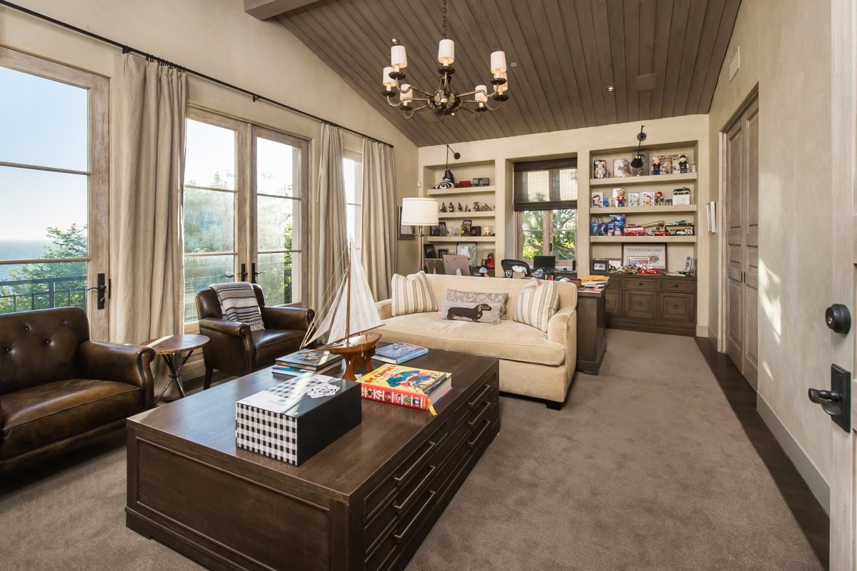 the-home-office-has-doors-leading-to-another-balcony