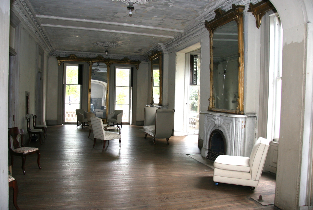 a-number-of-unique-pieces-from-the-original-house-were-salvaged-like-this-mirror