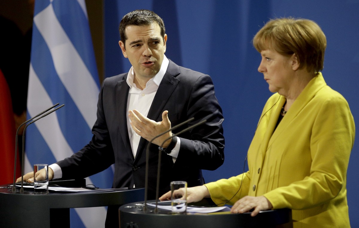 El primer ministro griego, Alexis Tsipras; y la canciller alemana, Angela Merkel