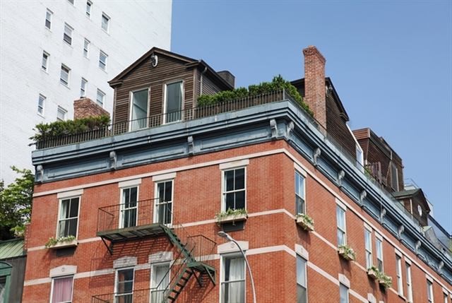 Una casa de campo en lo alto de un edificio de Nueva York y con vistas al Empire State