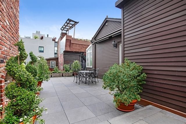 Una casa de campo en lo alto de un edificio de Nueva York y con vistas al Empire State