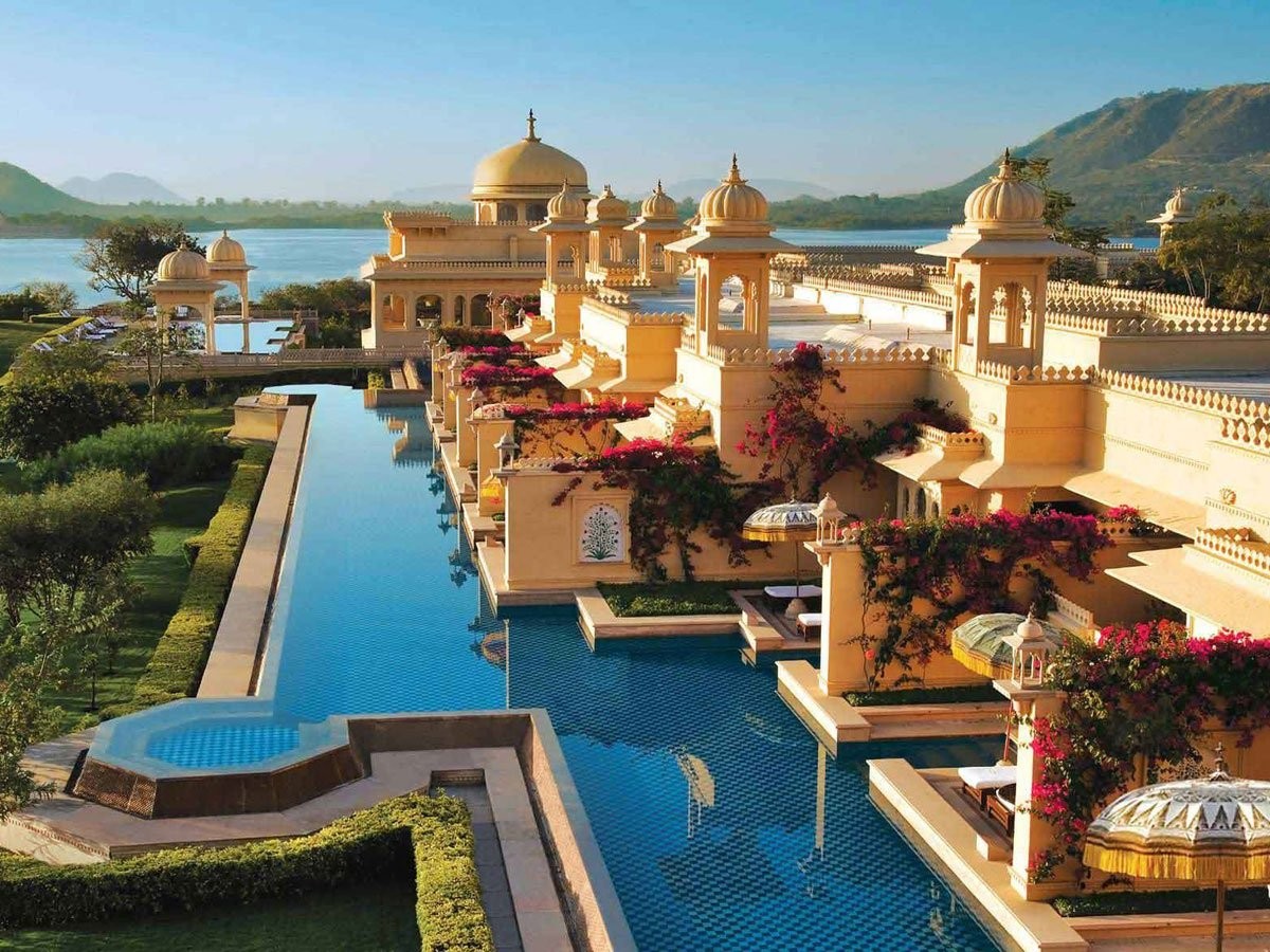 the-oberoi-udaivilas-in-india-has-a-gorgeous-pool-that-guests-can-swim-in-directly-from-their-pr