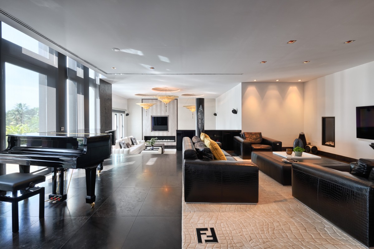 Living room with floor to ceiling windows