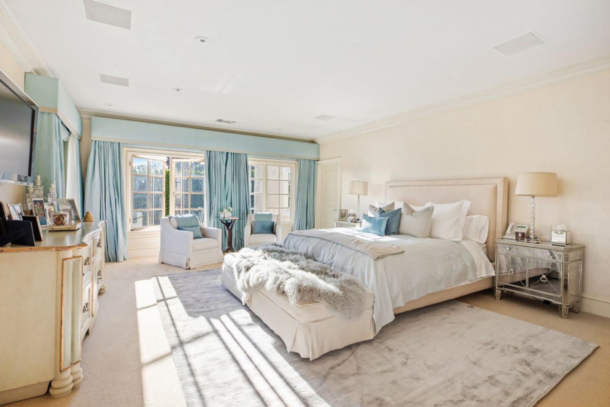 Dormitorio principal con salón