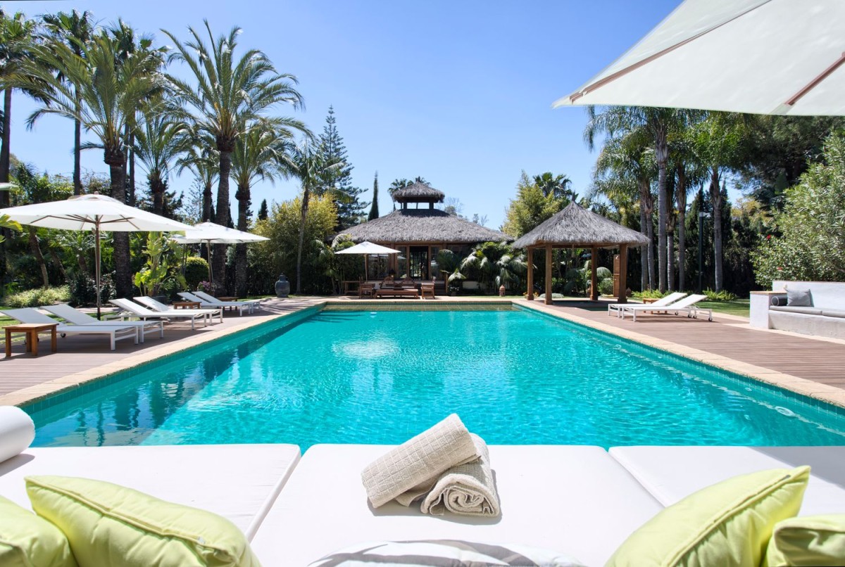 The villa has a large, stunning swimming pool and several relaxation areas