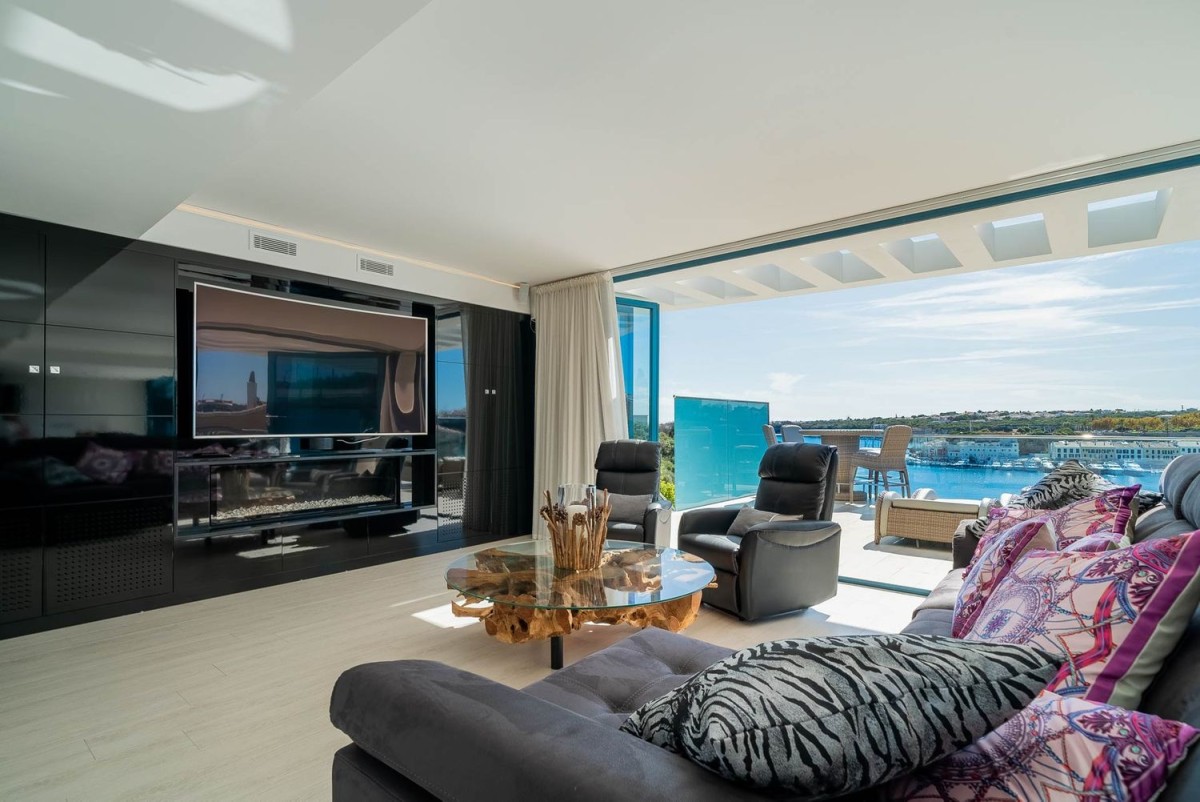 The main living area takes full advantage of the terrace and bright views