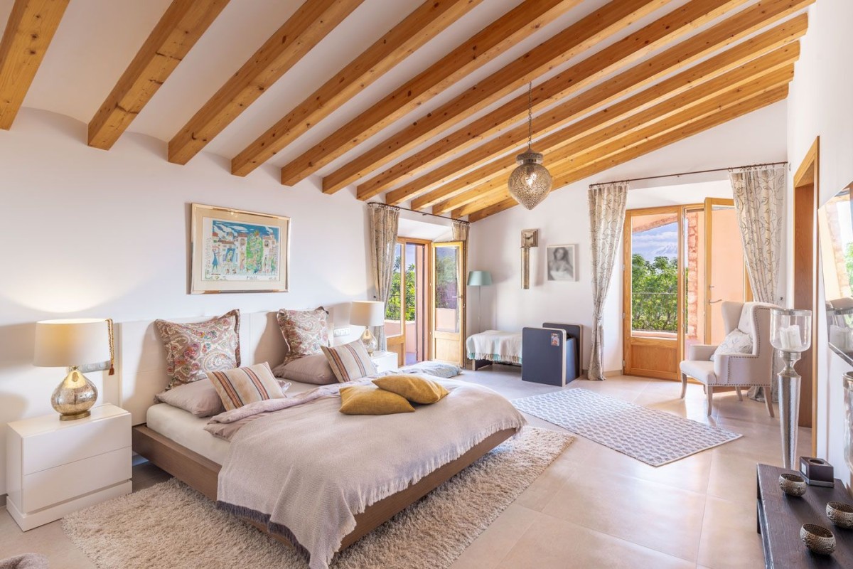 The bedrooms are spacious and bright with high ceilings