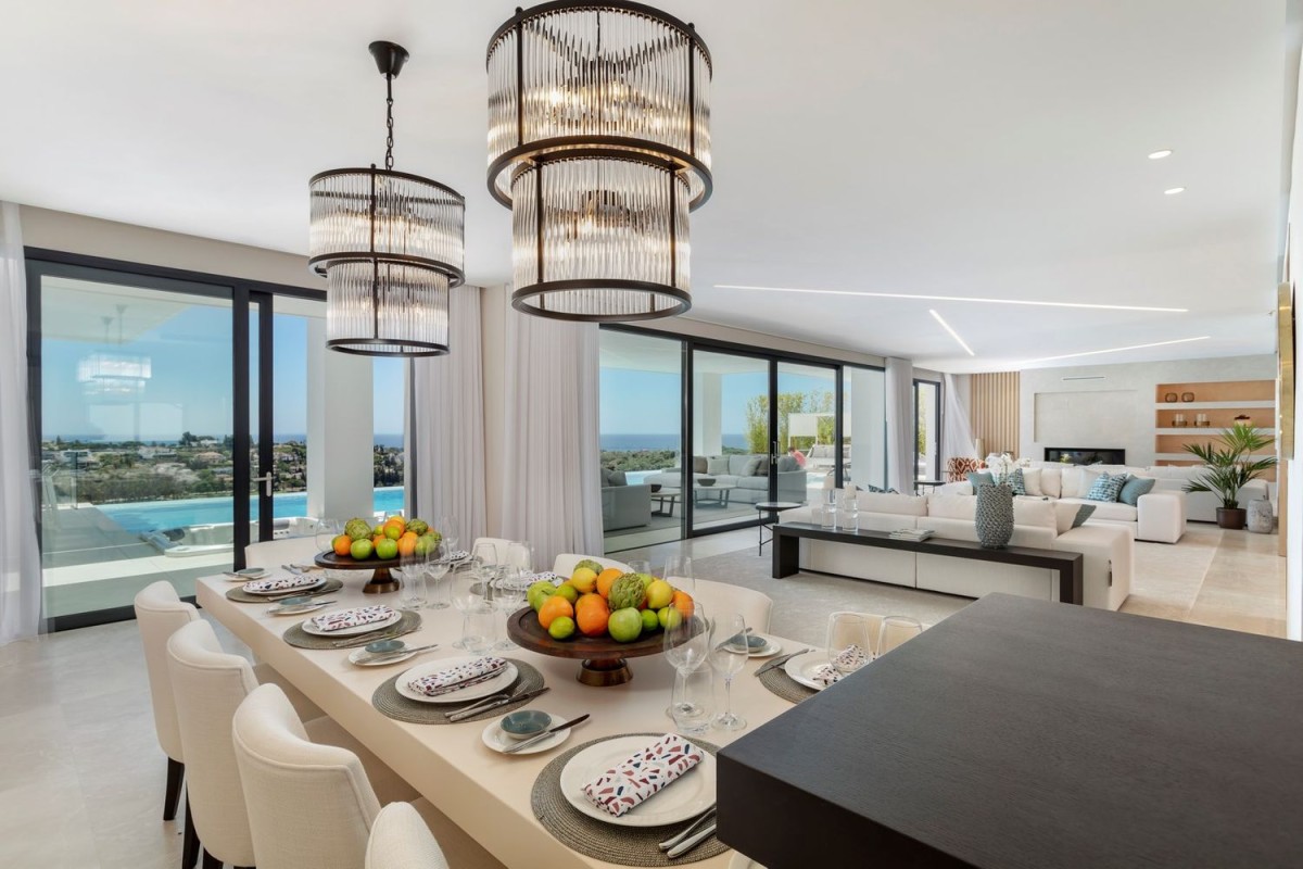 The kitchen opens into the living and dining area The kitchen opens into the living and dining area