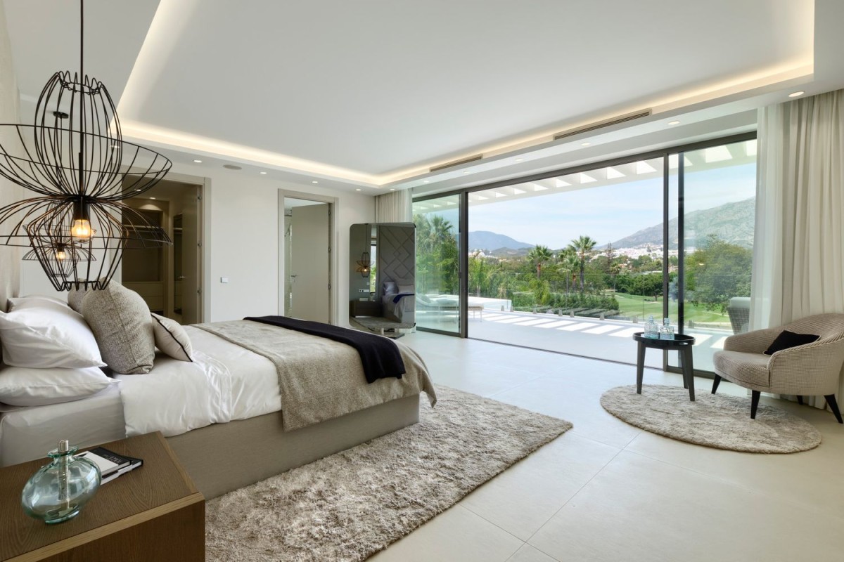 The luxury master bedroom is home to stunning views The luxury master bedroom is home to stunning views