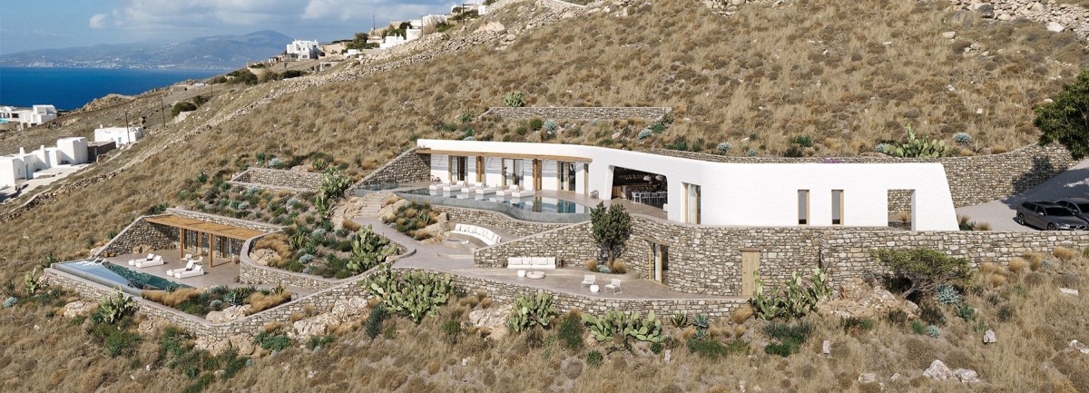 Una villa de diseño incrustada en una ladera de la isla griega de Miconos
