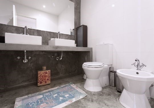 Microcemento: cómo aplicar este material de moda en la reforma de tu vivienda