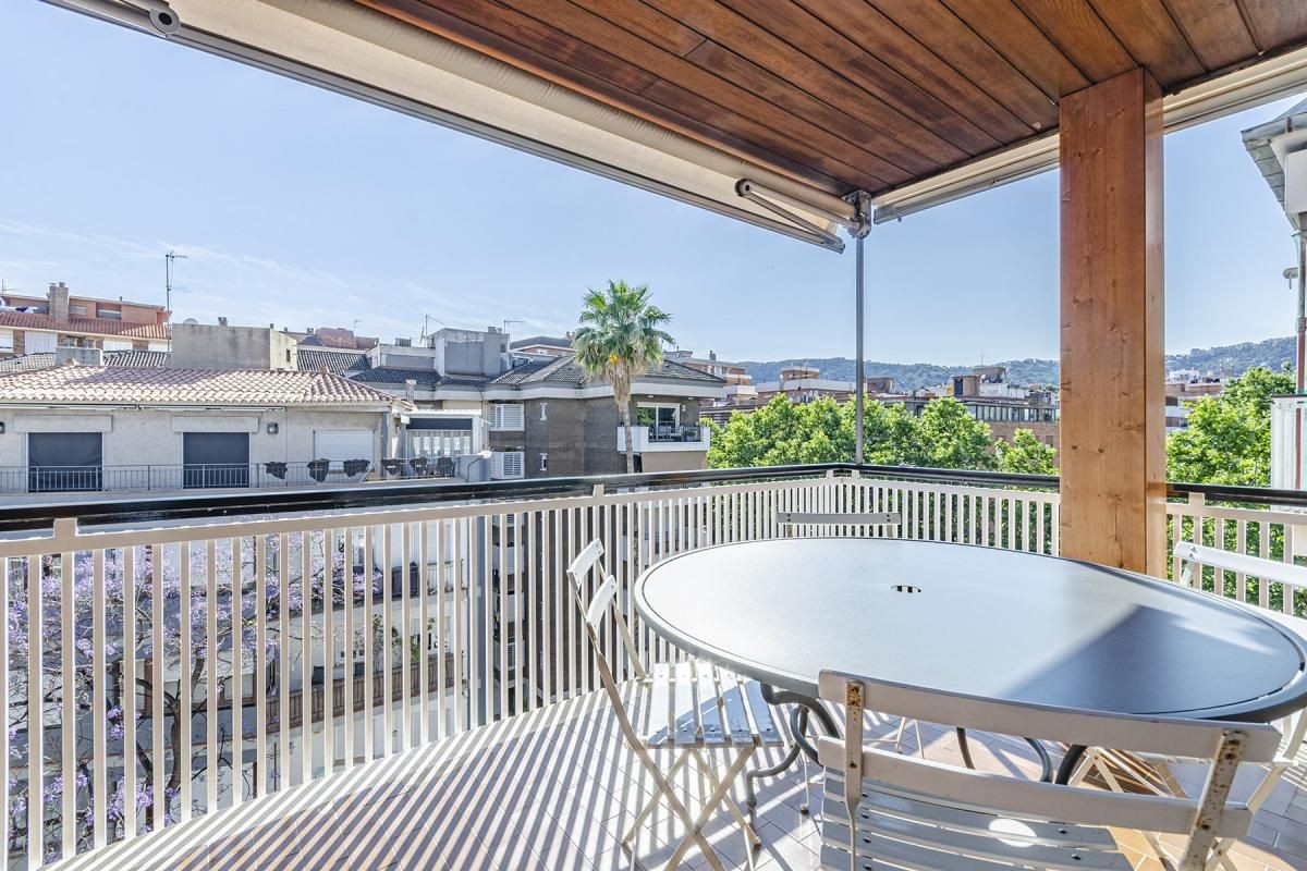 This penthouse has views of the mountains outside Barcelona