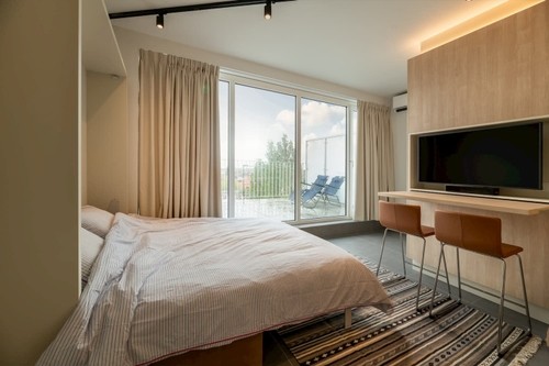 Dormitorio con cama extraíble SAM