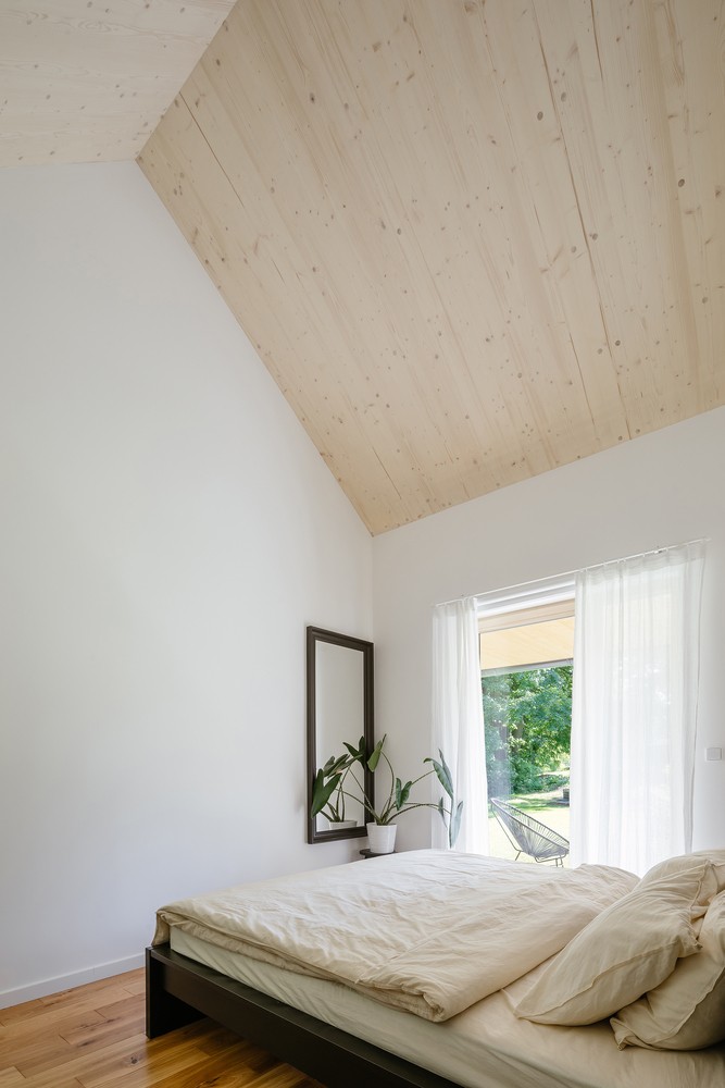 Dormitorio con ventanal