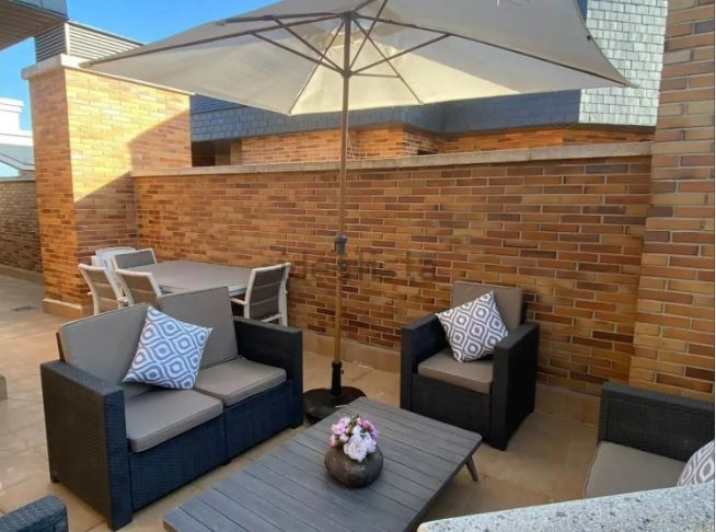 Terraza privativa de un ático en Madrid