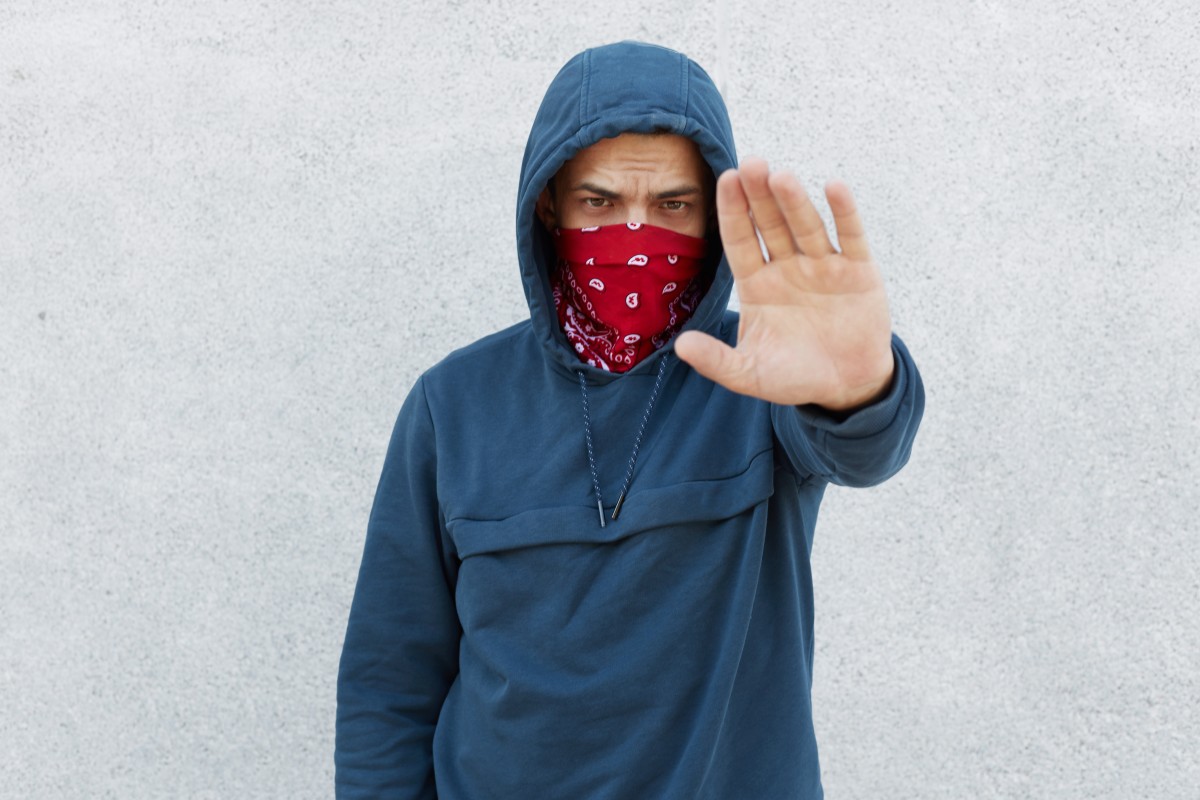 How to deal with a dangerous neighbor who is causing problems in the homeowners' association, such as noise or violence.