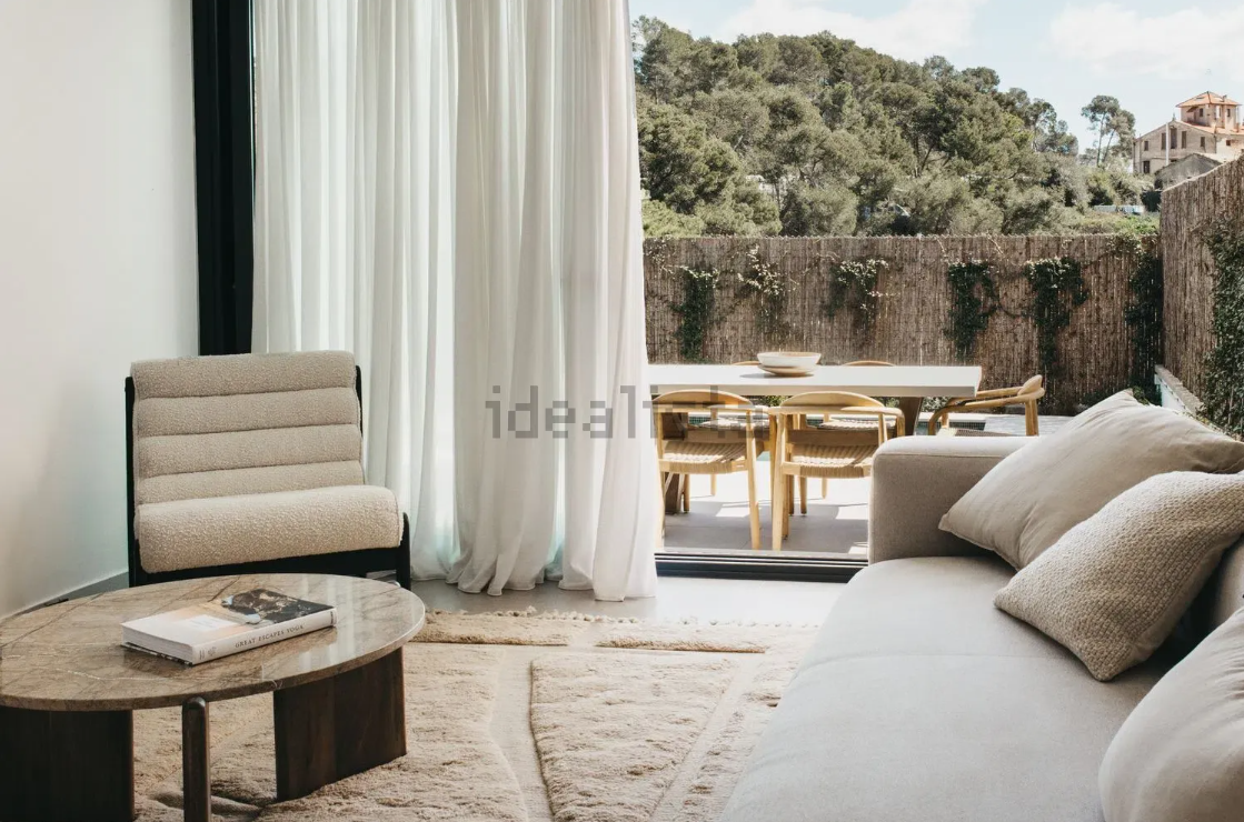 Salón de un chalet en Can Llobet