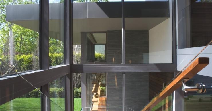  Casas de ensueño: el culmen de fusionar acero y madera de roble en una vivienda de lujo