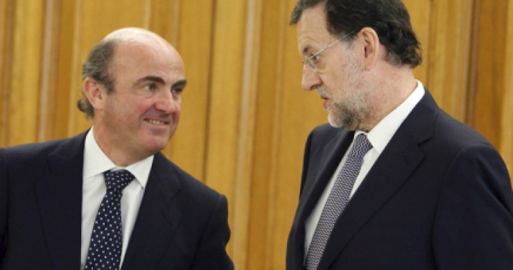 luis de guindos (izda) y mariano rajoy (drcha) De guindos elude aclarar si se suprimirá la deducción por compra de vivienda con carácter retroactivo