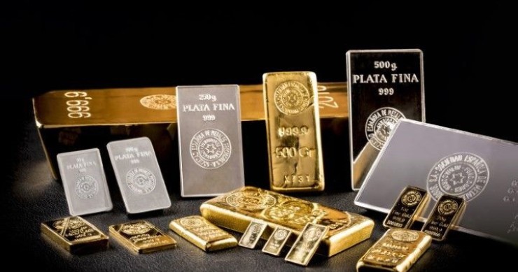 Archivo - Lingotes de oro y plata.