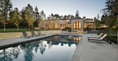 a-pool-fire-pit-and-patio-area-sit-just-outside-the-main-house