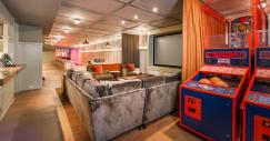 lets-jump-right-to-the-underground-batcave-it-contains-arcade-games-and-the-owners-collection-of