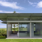 Una casa de acero prefabricado con un espectacular jardín y vistas a la costa de Australia